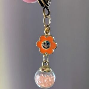 Orange Flower Charm Bag Charm With Fun Bead Globe